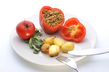 Red mince filled paprika with organic potato