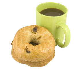 two bagels laying down and cup of coffee on white background