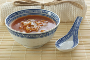 organic asian vegetable soup on a bamboo mat