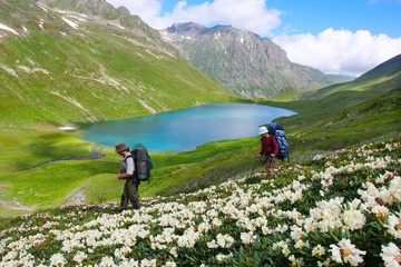Hiker in Caucasus mountains