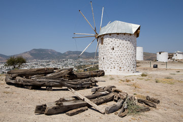 Fototapeta premium Medieval windmill overlooking Gumbet and Bodrum