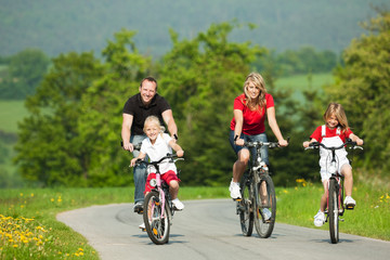 Family riding bicycles