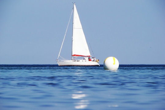 Fototapeta Yacht und Boje