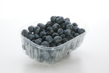 some sweet organic blueberries in a plastic container