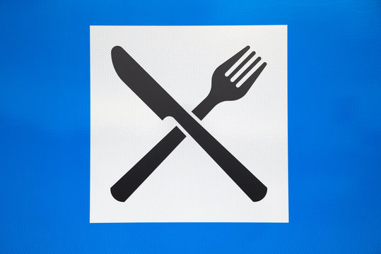 Restaurant road sign