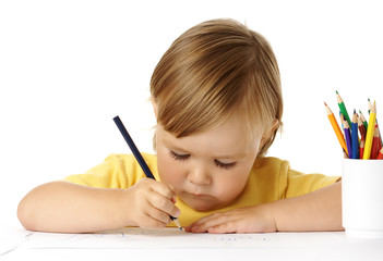 Child draw with crayons