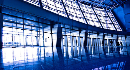 People are entering into exhibition centre hall