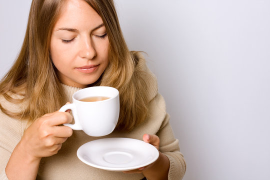Girl with a cup of tea