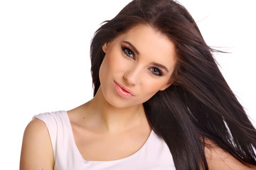 Naklejka premium Closeup portrait of a happy young woman smiling