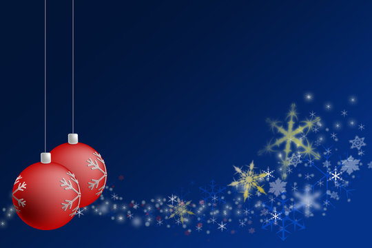 Two red christmas balls on blue background