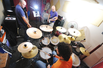 music band have training in garage