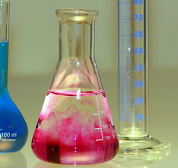 conical flask with red liquid in chemical laboratory