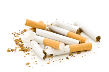 broken cigarettes on white background