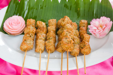 Meatballs on sticks at a market in Thailand
