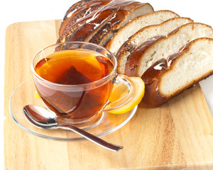 Fresh bun and cup of tea