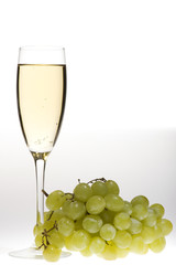 champagne glasses with grapes macro