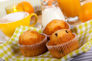 breakfast with muffin,coffee,milk  and orange juice