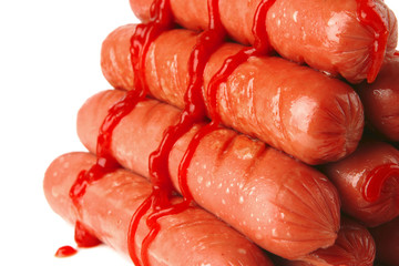 sauasges with ketchup