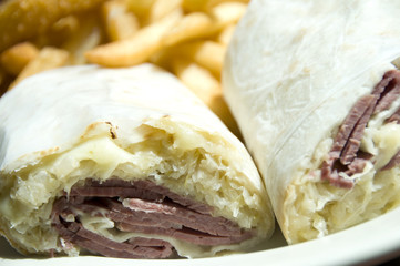 corn beef reuben sandwich wrap swiss cheese sauerkraut fries