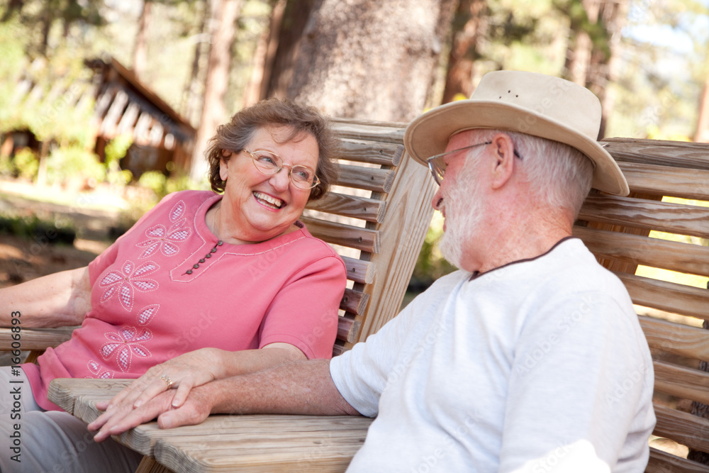 Wall mural loving senior couple outdoors