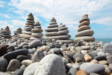 zen stones against sky