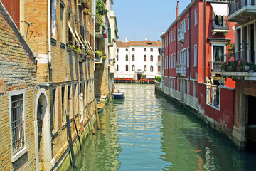 Fototapeta na wymiar View with colourful buildings and channels in Venice, Italy