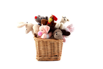 Soft toys in a wattled basket