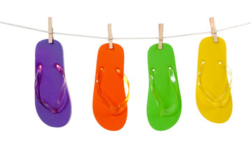 Colorful flip-flop sandles on a Clothesline