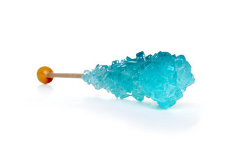 Isolated crystal sugar candy on a stick