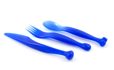Blue colored cutlery over white background