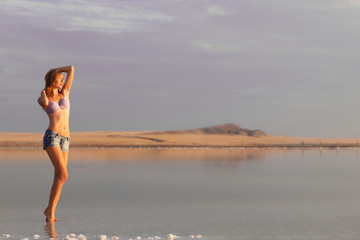 Fototapeta na wymiar girl in a salt lake