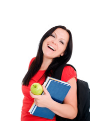 smiling brunette student woman with backpack and books