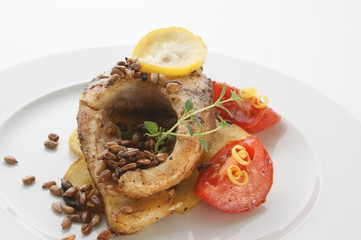grilled carp fillet on organic potato with vegetable