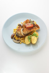 grilled carp fillet on organic potato with vegetable