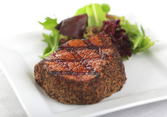 Steak dinner - juicy grilled pepper steak