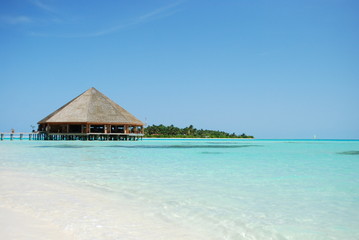 Bungalow's architecture and beach on a Maldivian Island