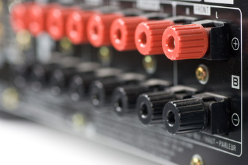 Rows of speaker terminals on back of amplifier