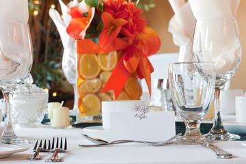 Table place setting with colorful center piece and place card