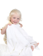 Playful Kid Holding a Bath Towel Smiling