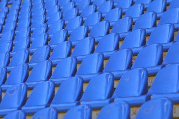 Naklejka premium Blue empty stadium seats