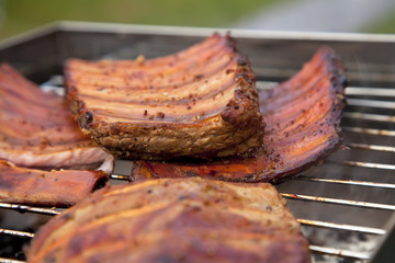 smoked pork ribs on a smoker grill