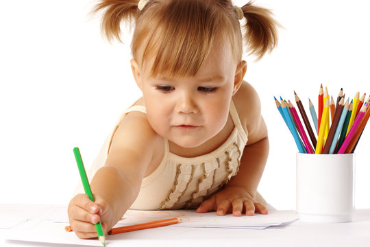 Cute Child Draw With Crayons