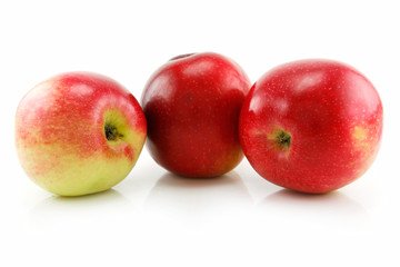 Fototapeta na wymiar Three Ripe Red Apples in Row Isolated on White