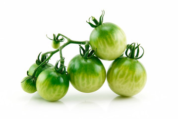 Bunch of Ripe Yellow and Green Tomatoes Isolated on White