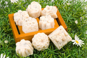 handmade soap on green grass