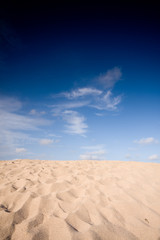 Fototapeta na wymiar Sand with blue sky