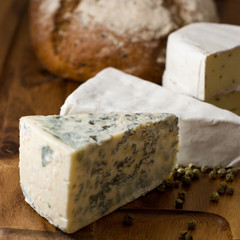 Blue Cheese with Brie and loaf of bread