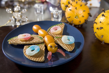 butterfly made up from fruit and waffle