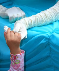 Fototapeta premium hands in silk gloves holding kids hand