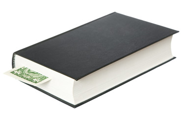 Book with dollar as bookmark